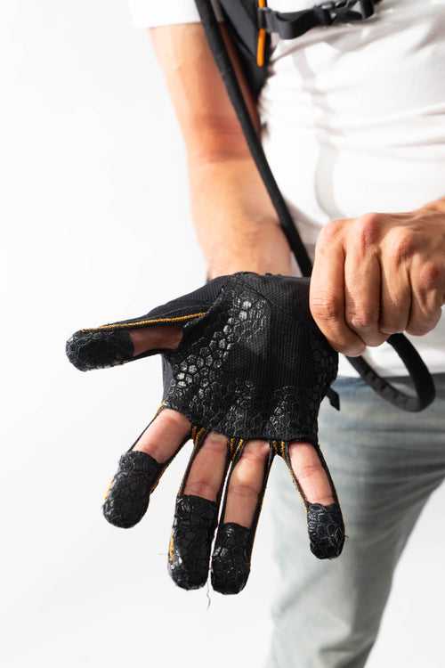 Skelex Iron Hand worn by a worker during a gripping task