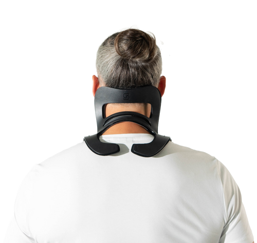 Skelex Neck worn by a worker looking upward